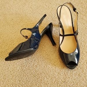 Navy blue open toe pumps